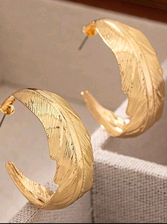 Medical metal earrings with leaf and feather engraving